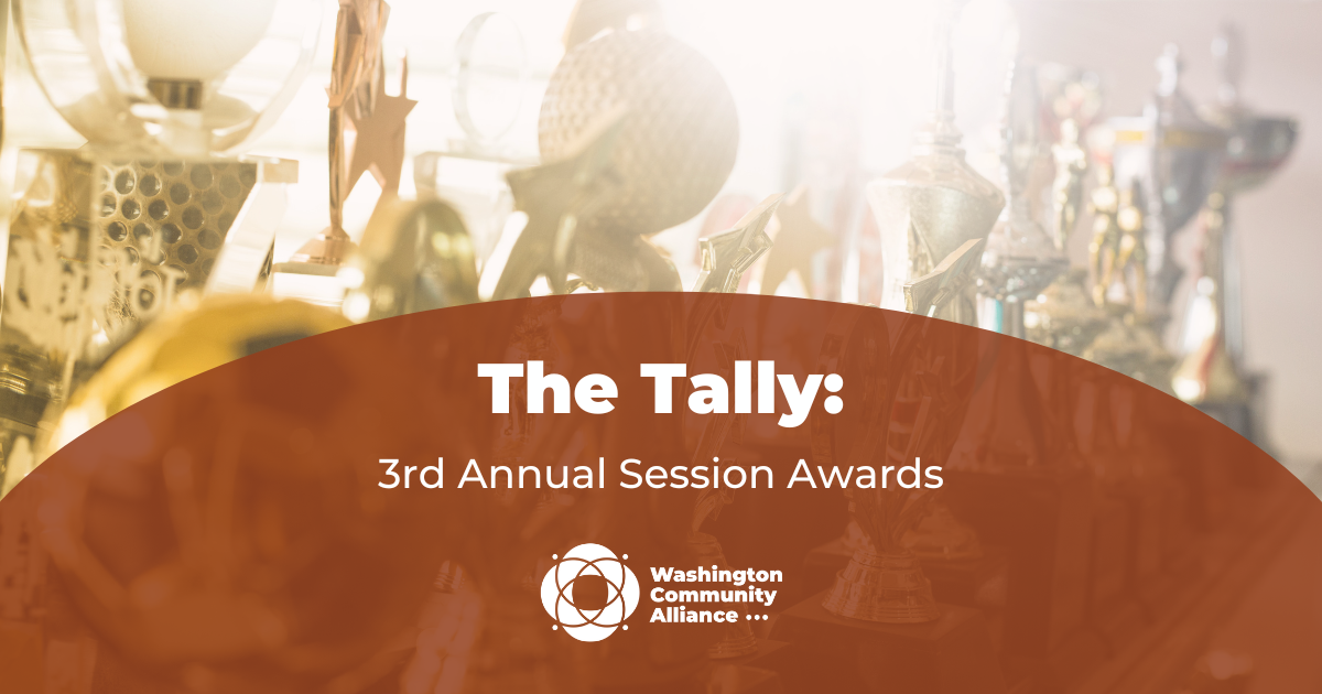Out of focus photo of several gold awards in the background with a rust colored arch overlayed and in white text reads "The Tally: 3rd Annual Session Awards" with the Washington Community Alliance logo.