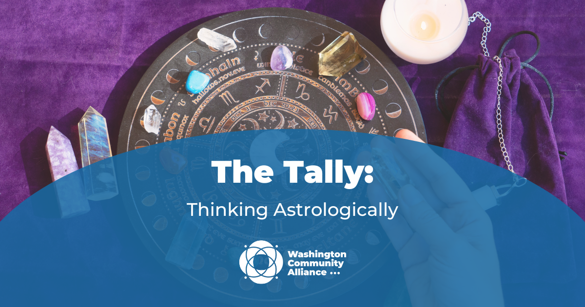 Graphic for The Tally blog titled "Thinking Astrologically" with a photo of an astrological tool and crystals in the background.